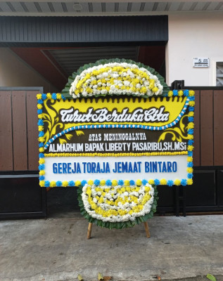 Papan Bunga Duka di Pekayon